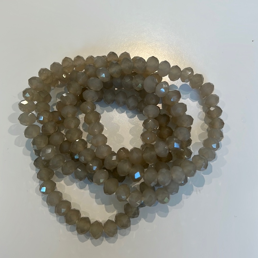 Set of taupe/grey stretchy bracelets
